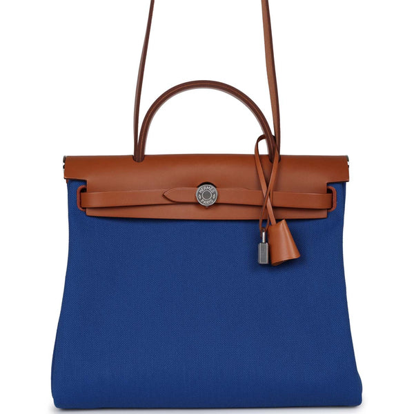 Hermès, a 'Herbag Zip 31' handbag in Bleu Saphir Hunter leather