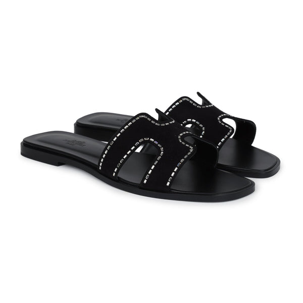 Hermes black oran sandals hotsell