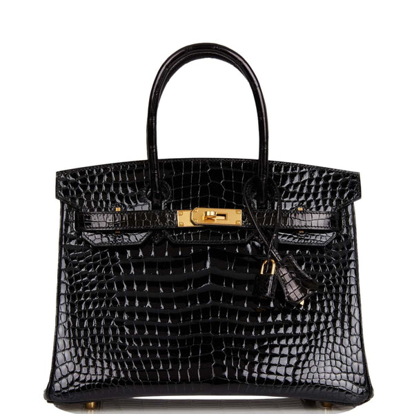 Hermès Vintage Shiny Black Porosus Crocodile Bag with Gold Hardware 28, 1940.