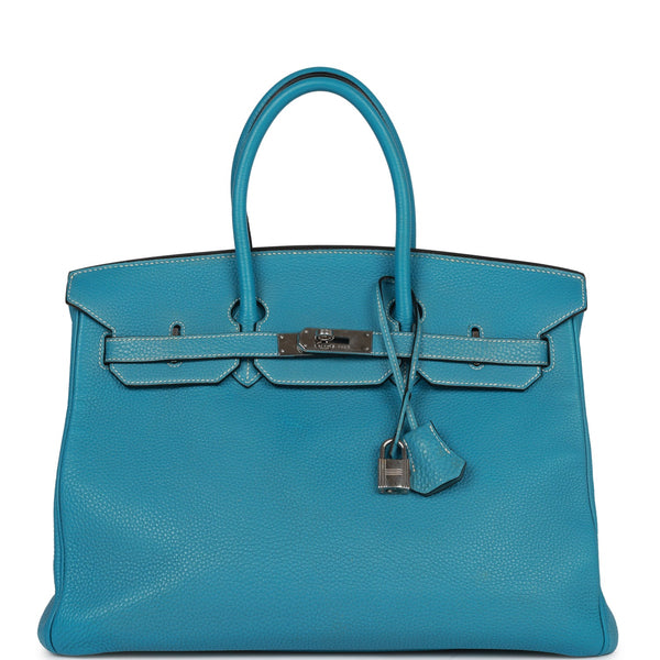 Sold at Auction: HERMES 24/24 35 Bag Blue Brighton Togo Swift Leather  Palladium Hardware