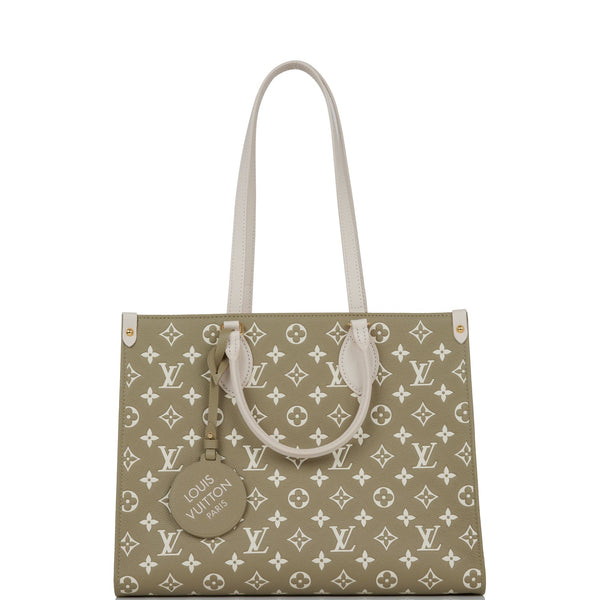 Louis Vuitton Onthego MM Epi White Tote  Designer Handbag Consignment  Boutique Raleigh NC