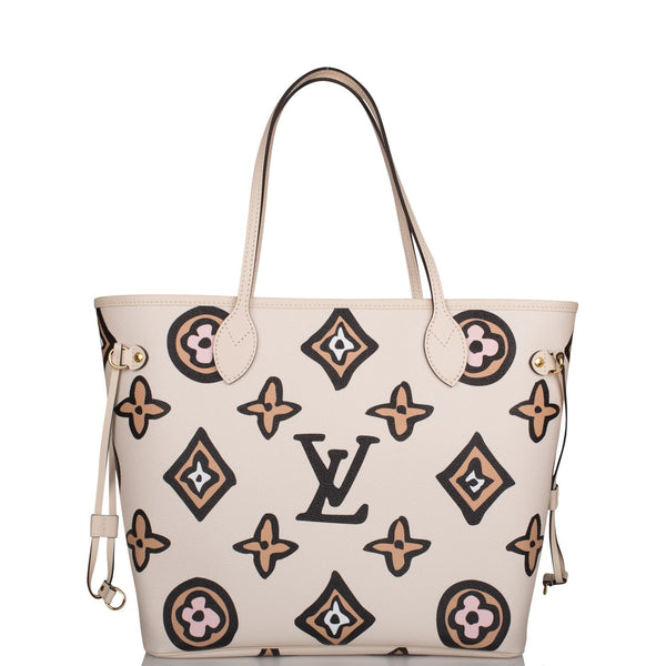 LV Wild at Heart Neverfull MM Creme Excellent Condition Completens : box,  receipt, card & dustbag Size : 31x28cm IDR 42.000.000