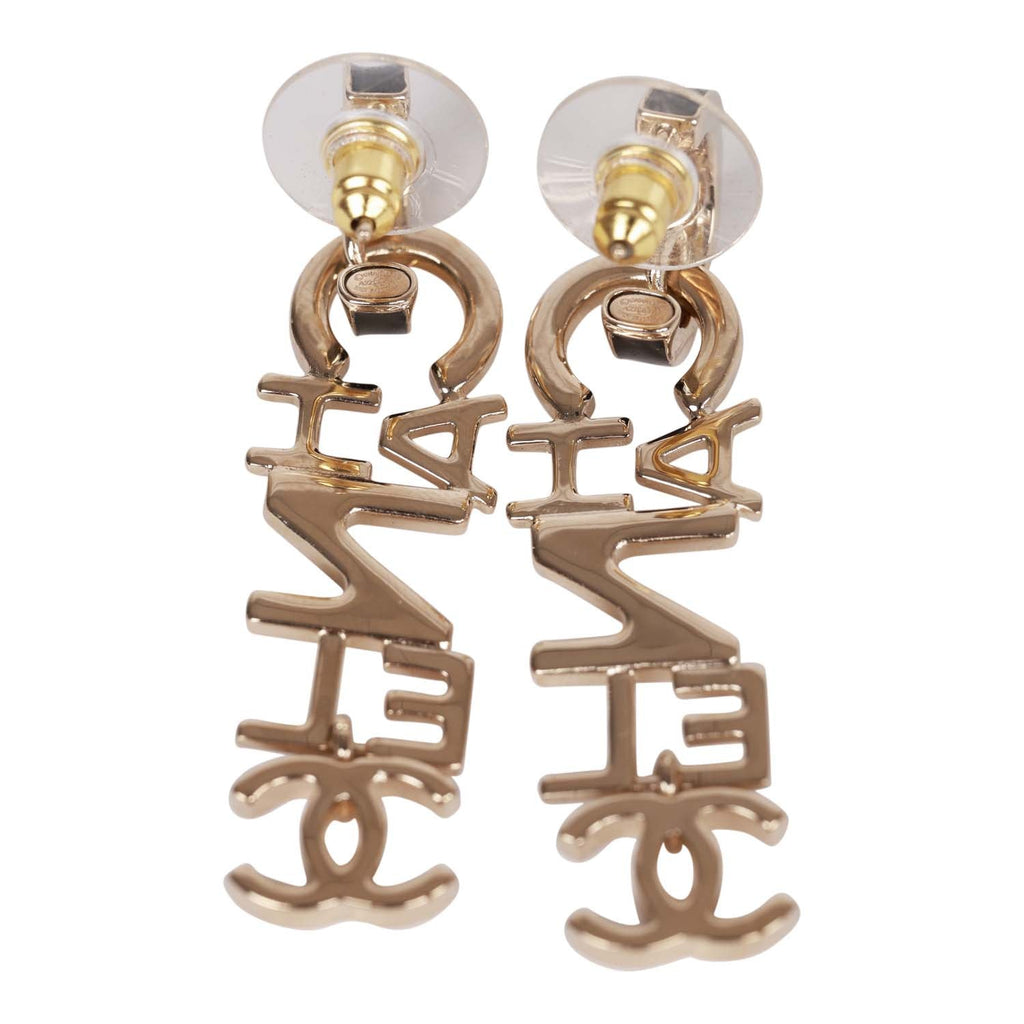 Chanel metal black and white letter earrings
