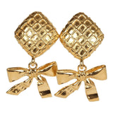 Vintage Chanel Dangle Bow Clip On Earrings Gold Metal