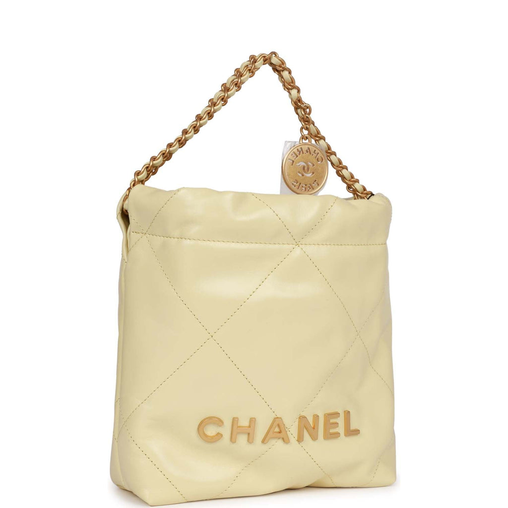 Chanel 22 small handbag, Shiny calfskin & gold-tone metal , yellow —  Fashion