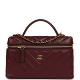 Chanel Chevron Top Handle Long Vanity Case with Chain Dark Burgundy Shiny Caviar Gold Hardware - Thumbnail View 1