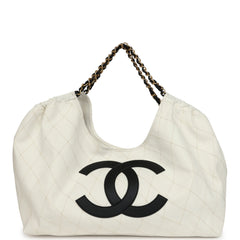Chanel Maxi Coco Beach Cambon Hobo Bag White Denim and Black Calfskin Brushed Gold Hardware