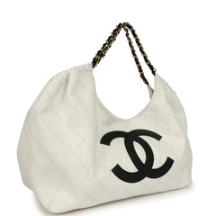 Chanel Maxi Coco Beach Cambon Hobo Bag White Denim and Black Calfskin Brushed Gold Hardware