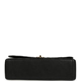 Chanel Maxi Classic Double Flap Bag Black Caviar Gold Hardware