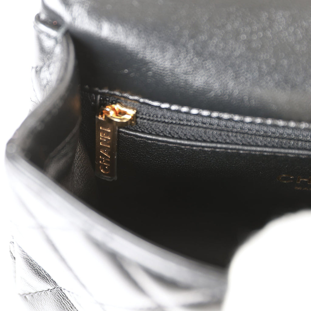 Flap bag with top handle, Lambskin & gold-tone metal, black — Fashion