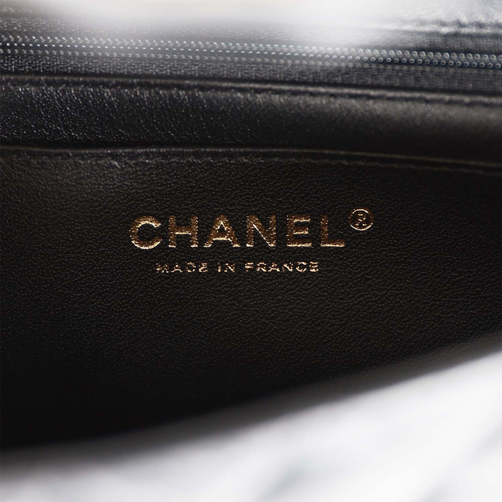 Mini flap bag with top handle, Tweed, lambskin & gold metal, white & black  — Fashion