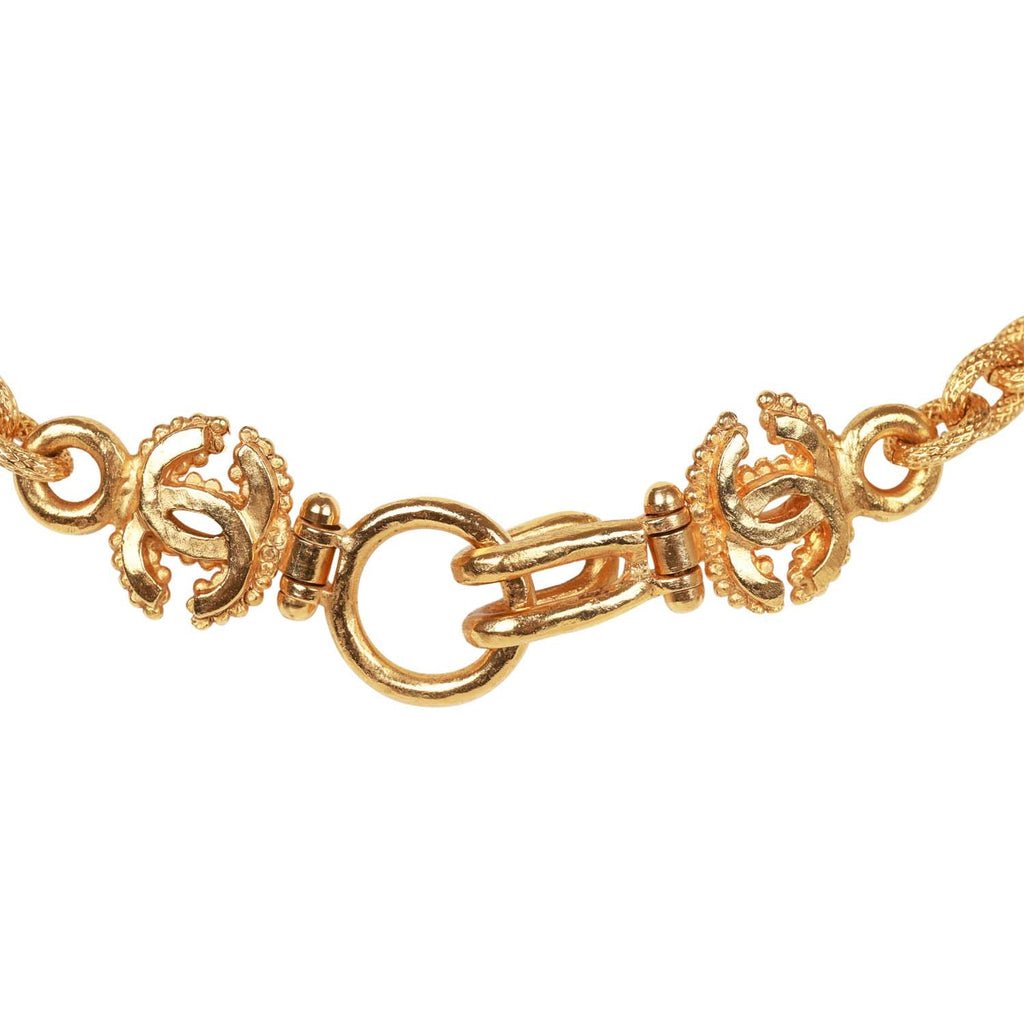 Vintage Chanel Gold Embossed CC Logo Pendant Necklace – Madison Avenue  Couture