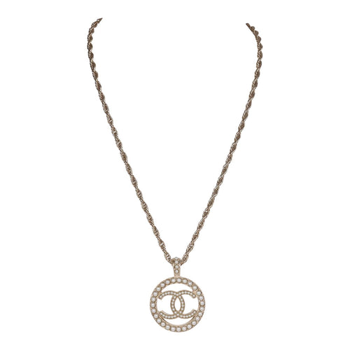 Chanel Black and Silver CC Crystal Heart Pendant Necklace – Madison Avenue  Couture