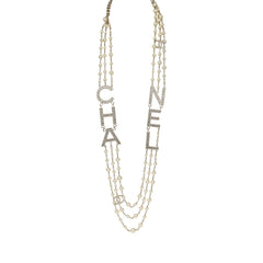Chanel Long Crystal CHA-NEL Multi-Strand CC Pearl Necklace Ivory Pearls, Light Gold Tone Hardware