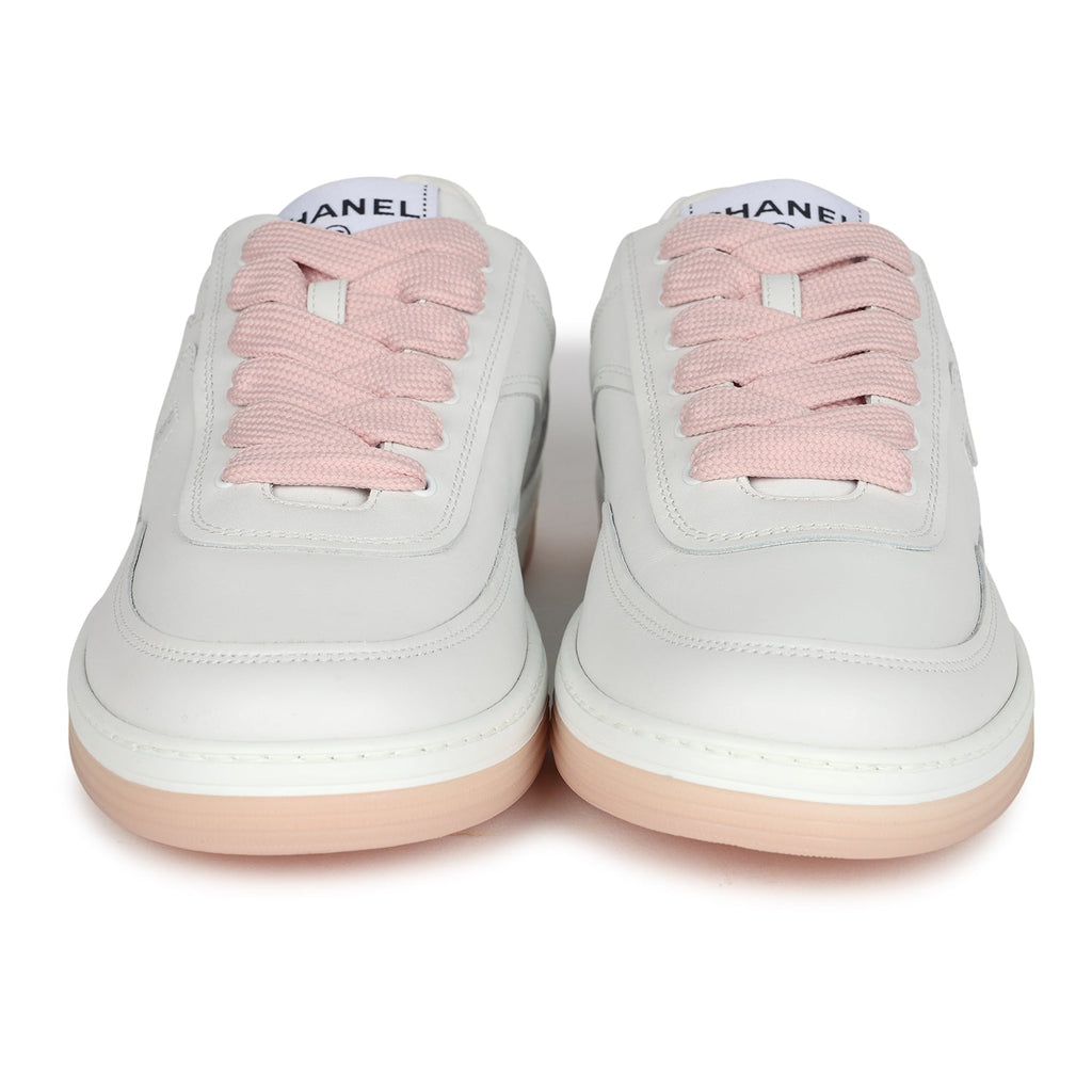 Orders pink and white chanel sneakers