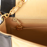 Vintage Chanel Medium Diana Flap Bag Black and Beige Lambskin Gold Hardware