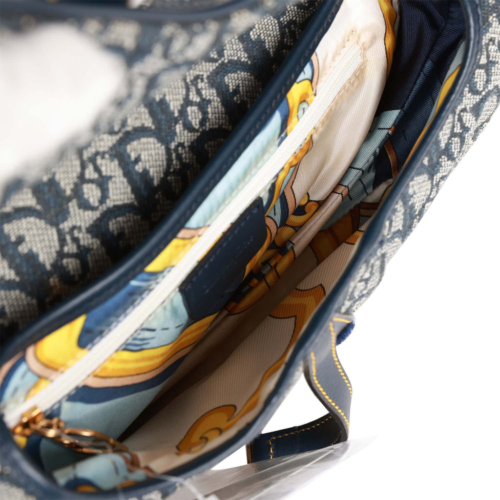 Vintage Christian Dior Saddle Bag Grey Diorissimo Canvas Gold Hardware –  Madison Avenue Couture