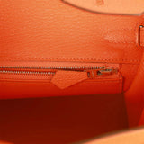 Hermès Kelly 25 bag in H orange chevre with PHW - DOWNTOWN UPTOWN Genève