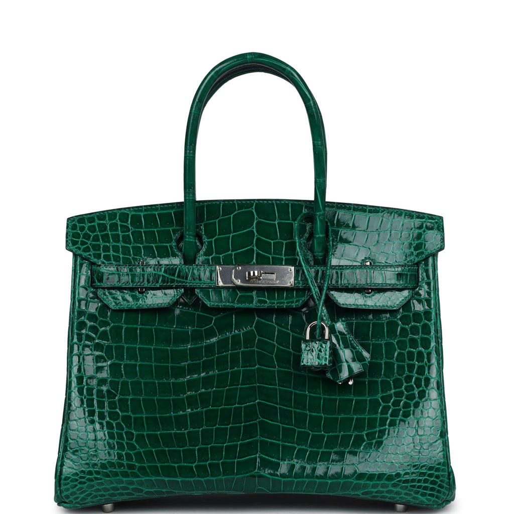 Close-up view of a green crocodile pattern Hermes Birkin leather