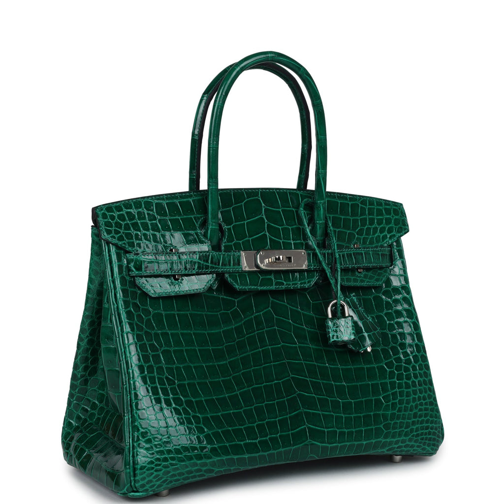 Close-up view of a green crocodile pattern Hermes Birkin leather