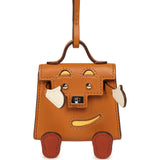 Hermes Mini Kelly Doll Idole Bag Charm Naturel Sable Butler and Nata, Brique, Jaune Mango Chevre Mysore Palladium Hardware - Thumbnail View 1