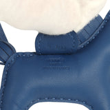 Hermès Rodeo Bag Charm PM in Bleu Tie Milo lambskin, designed as a horse with a stamped logo and brand origin text.