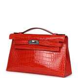 Hermes Kelly Pochette Orange Poppy Shiny Alligator Palladium Hardware