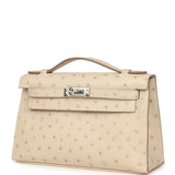 Hermes Kelly Pochette Craie Ostrich Palladium Hardware