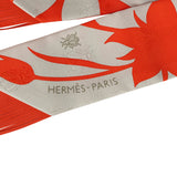 Hermes "Bouquet Final" Gris Perle and Vermillon Fringe Silk Twilly