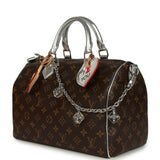Louis Vuitton "57th Street NYC" Speedy 30 Bandouliere Brown and Silver Monogram Silver Hardware