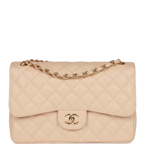 Chanel Maxi Classic Double Flap Bag Black Quilted Caviar Silver Hardwa –  Madison Avenue Couture
