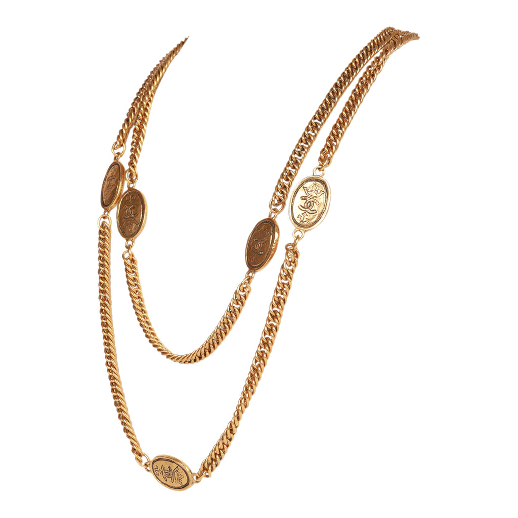 Gold double Chanel CC Pendant Necklace, double Chanel Classic Flap or  Vintage VCA Alhambra