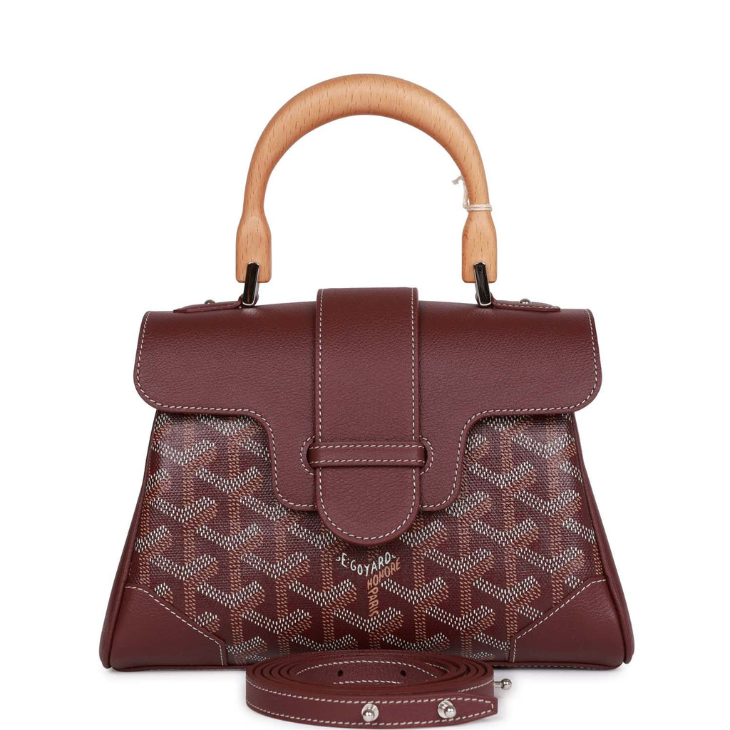 Crafted from Goyardine, the Goyard Mini Vendome is the ideal