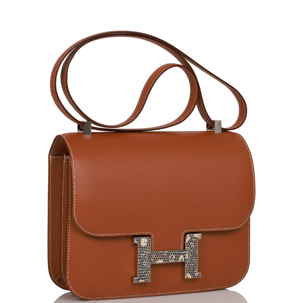 Constance leather clutch bag Hermès Orange in Leather - 33179348
