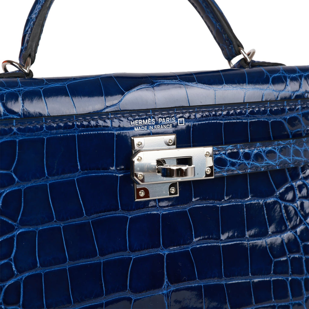A LIMITED EDITION BLEU SAPHIR SWIFT LEATHER PADDED SELLIER KELLY 25 WITH  PALLADIUM HARDWARE
