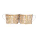 Hermes "Mosaique Au 24" Gold Porcelain Tea Cup and Saucer Set