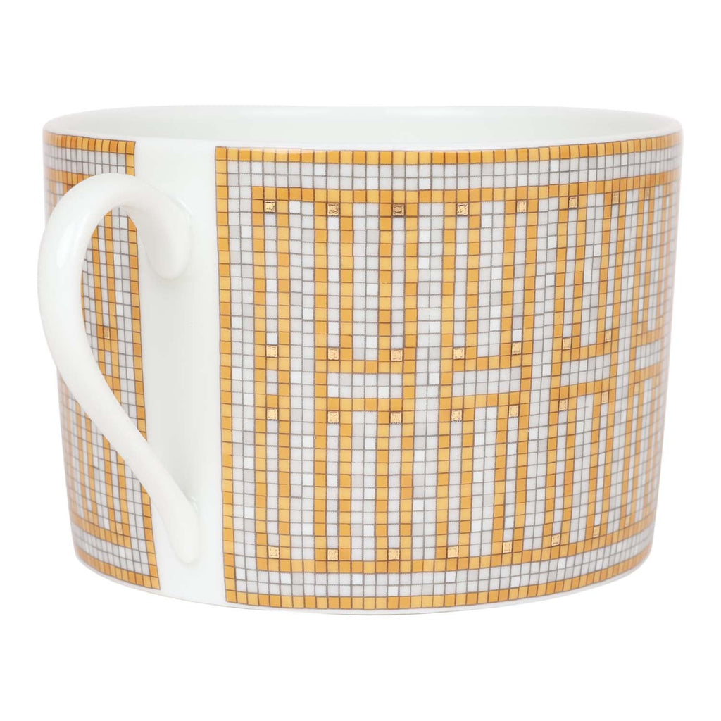 Hermes "Mosaique Au 24" Gold Porcelain Tea Cup and Saucer Set