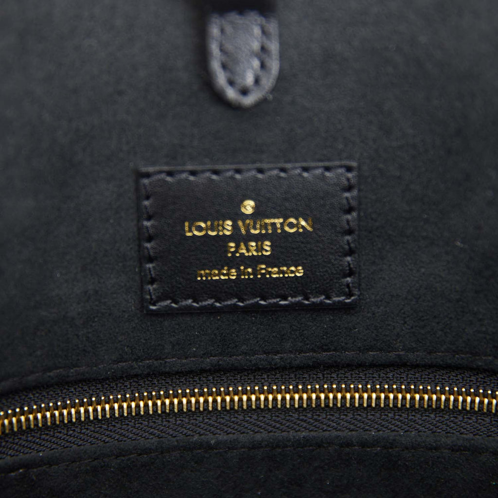 Louis Vuitton Black and Cream Empreinte Giant Monogram OnTheGo MM – Madison  Avenue Couture