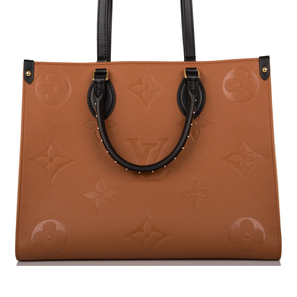 Louis Vuitton Caramel Monogram Giant Empreinte Leather Wild at Heart Multi  Accessories Pochette Bag - Yoogi's Closet